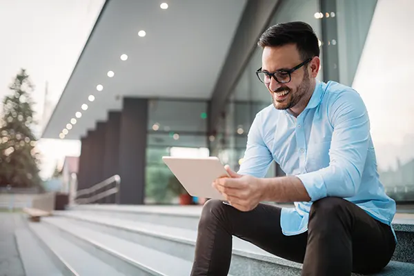 Home page Careers, Man with tablet